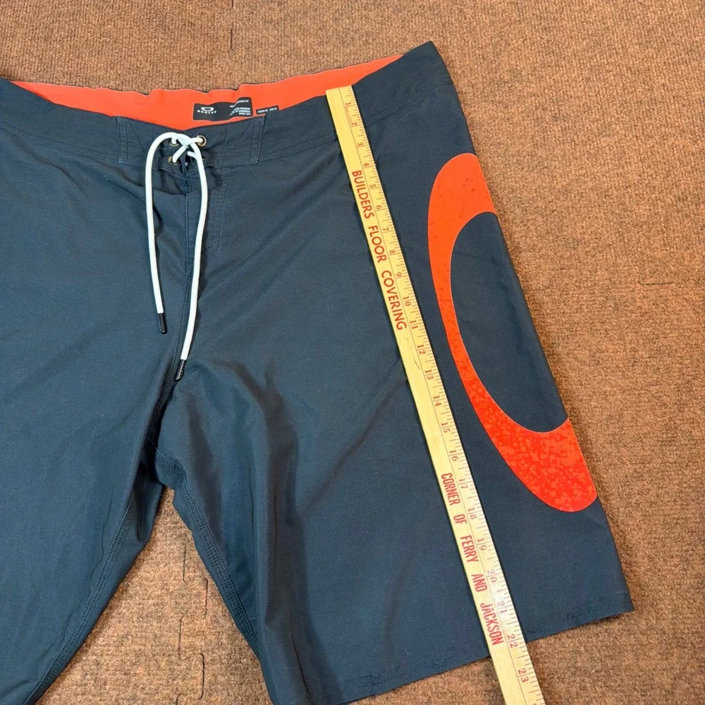 A+ Oakley Performance Fit Board Shorts Mens 38 Black Orange Ellipse Swim Trunks
